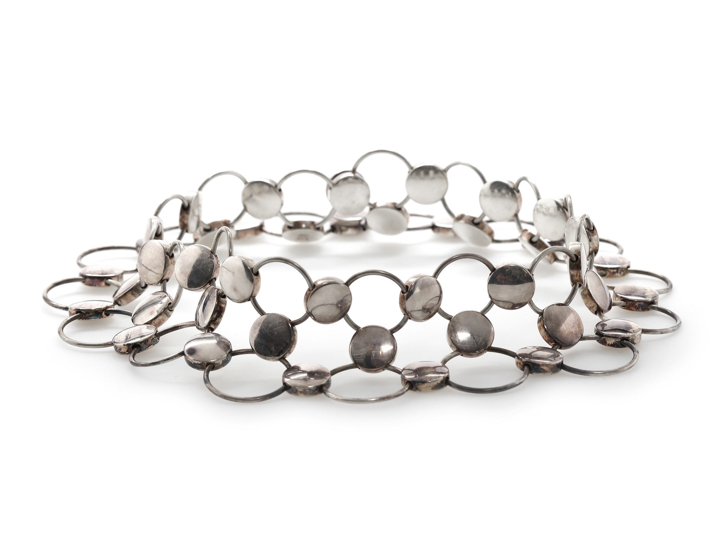 Discover the stunning Georg Jensen Regitz Overgaard Necklace, a perfect blend of creativity and craftsmanship. Elevate your style with this exquisite piece that embodies timeless elegance.